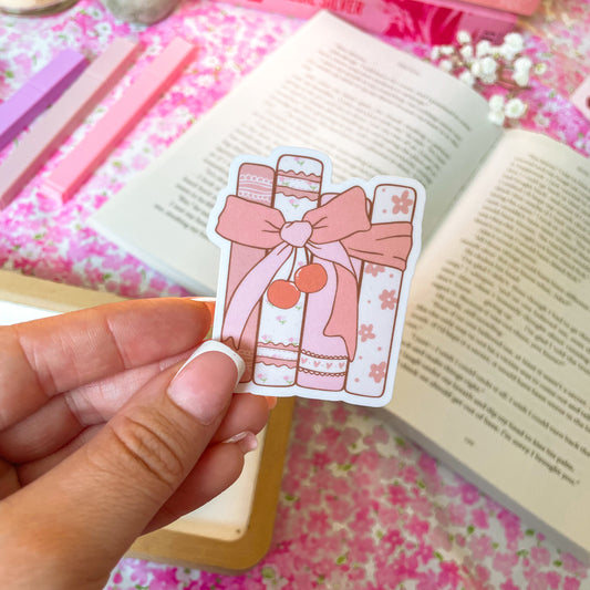 Cherry bow book stack - Sticker